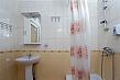 Эконом 4х местный: Просторный номер с односпальными кроватями и удобствами в номере.